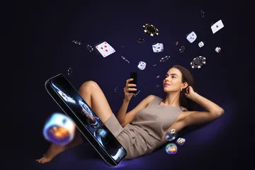 A professional dealer in a tuxedo greeting players at the roulette table, symbolizing the authentic live casino feel at JILIDD.